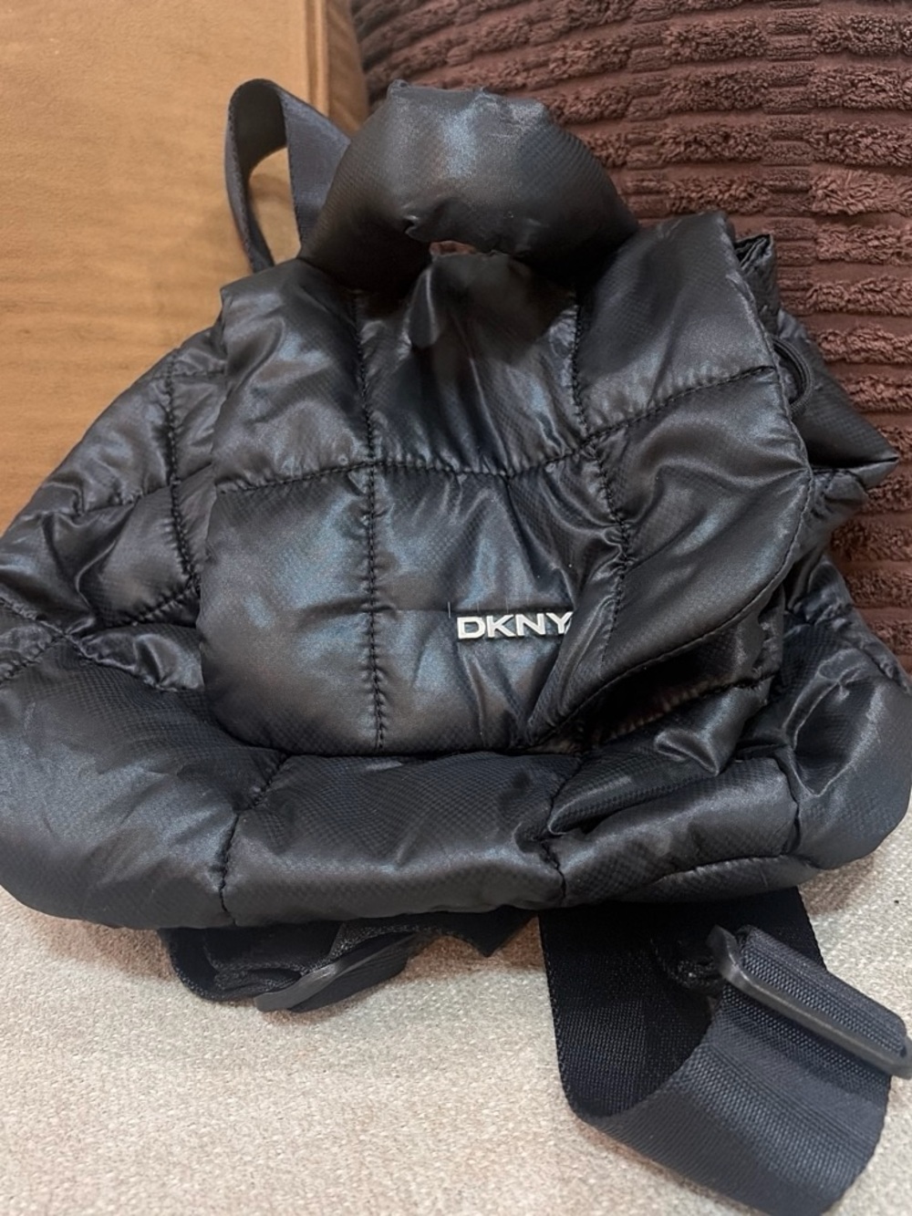 DKNY Black Quilted Puffer Backpack with Silver Logo